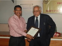       Prof. O. P. Varma presenting citation to Prof. B. C. Sarkar