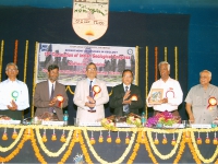 Dr. S. Asokan, President, releasing the Special Volume on â€œNatural Hazardsâ€ (ed. O.P. Varma) at the Inaugural Function.